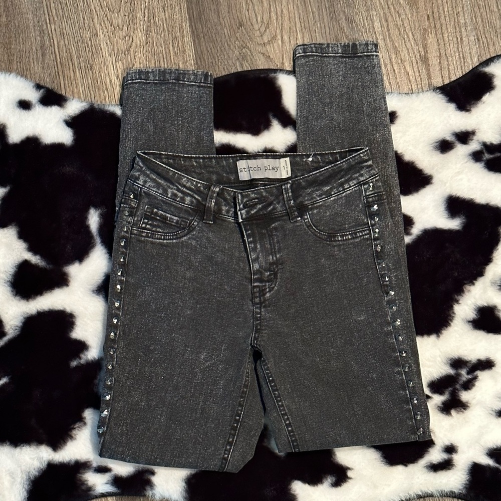 Studded acid wash black skinny jeans